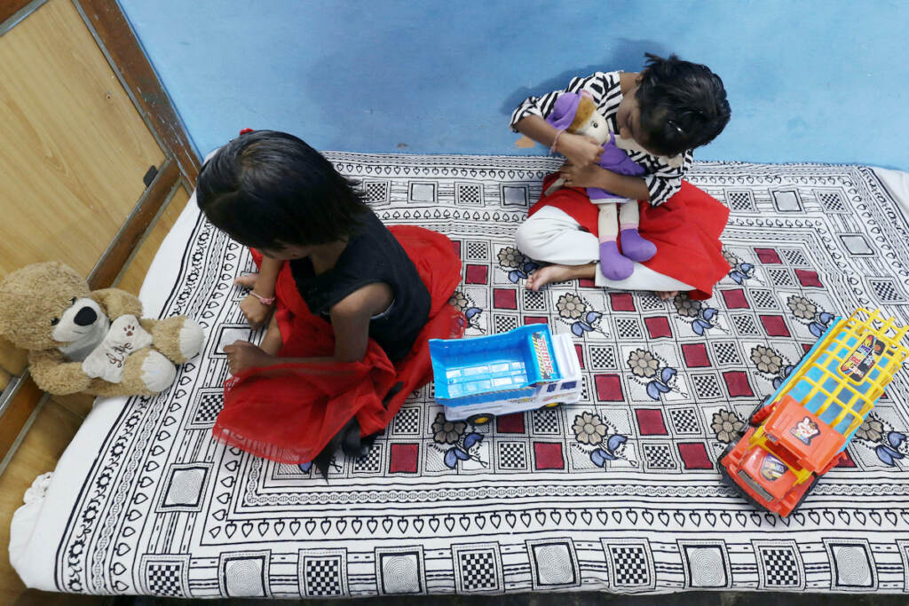 Tripti and Pari play at a relatives home in India