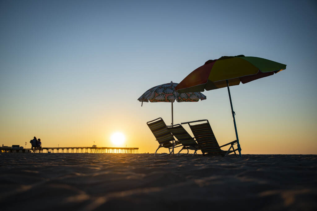 Beach chairs are seen as the sun rises in Ocean City, N.J., on Aug. 18. This is not the above-average hurricane season experts predicted — at least, not yet. Beach chairs are seen as the sun rises in Ocean City, N.J., on Aug. 18. This is not the above-average hurricane season experts predicted — at least, not yet. (Al Drago/Bloomberg via Getty Images)