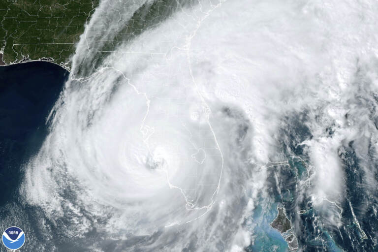 A satellite image shows Hurricane Ian making landfall in southwest Florida