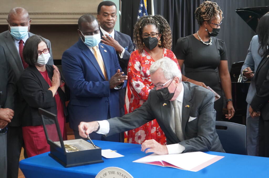 new-jersey-black-heritage-trail-t-donyea-2022-09-07 Gov. Phil Murphy signed a law on Sept. 7, 2022 establishing the New Jersey Black Heritage Trail and Commission. The signing happened at the Newark Public Library. (Tennyson Donyéa / WHYY)