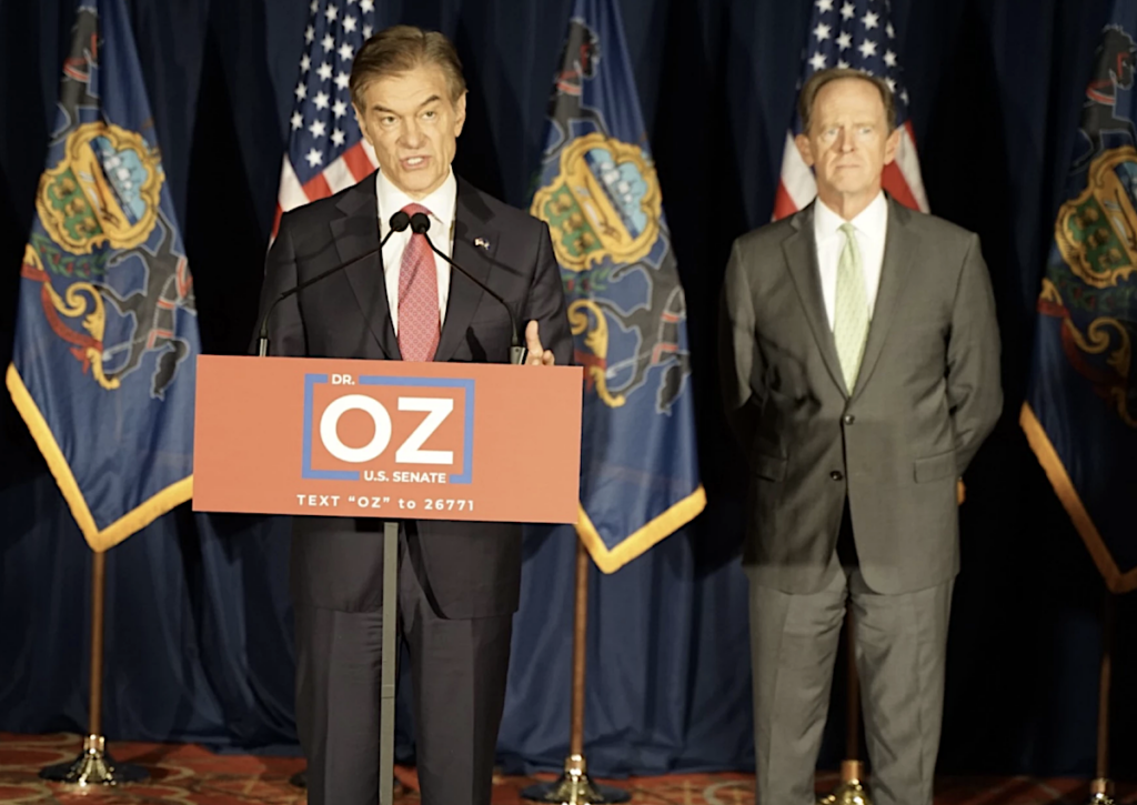 Republican Senate candidate Mehmet Oz called out his opponent for not answering questions in public at a press conference with Pennsylvania Sen. Pat Toomey on Friday. (Oliver Morrison/WESA)