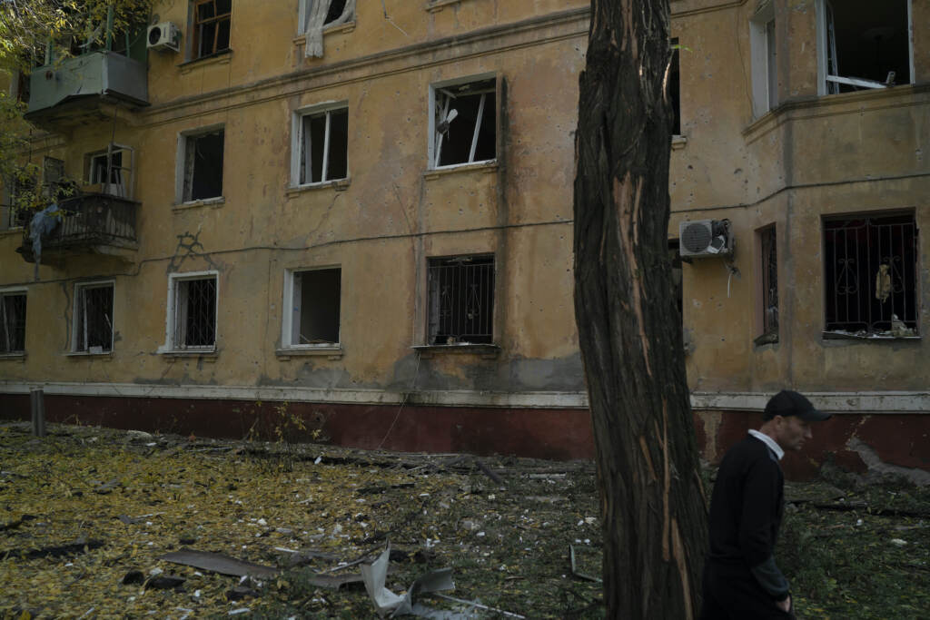Russia Ukraine War A man walks past a damaged building after a Russian attack in Kramatorsk, Ukraine
