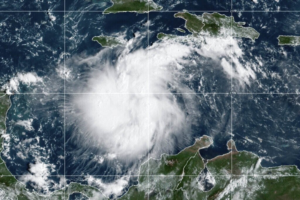Tropical Weather A meteorological map shows a white circle passing through ocean and land.
