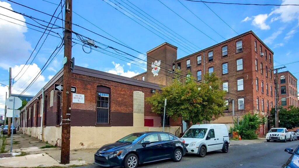 vikingmills-exterior-1-1024×576 Viking Mill is a former warehouse on East Boston Street that was converted to studios and is now being turned into apartments. (Instagram/@vanwhit13)