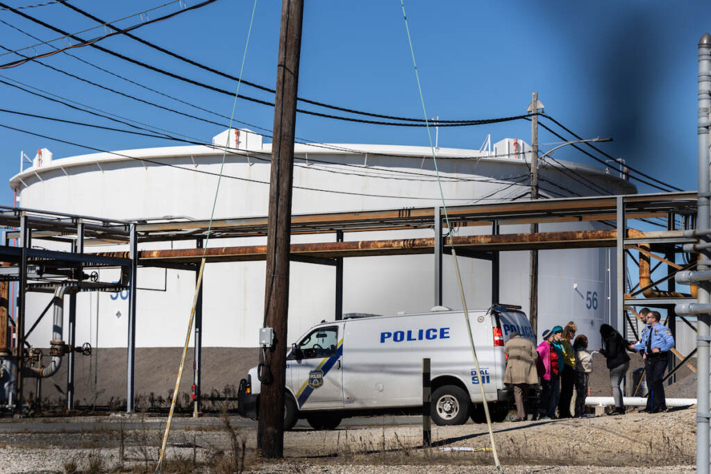 10 27 2022 k paynter arrested protesters oil tank farm protest-2 Seven protesters were arrested for hopping the fence to a restricted area of the Southwest Philadelphia oil tank farm during a protest on Oct. 27, 2022. (Kimberly Paynter/WHYY)