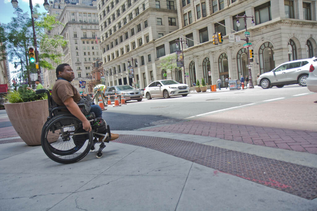 2022 06 29 kpaynter jaleel king crosswalks in wheelchairs (1 of 1) Jaleel King is seen in a wheelchair at Broad and Chestnut