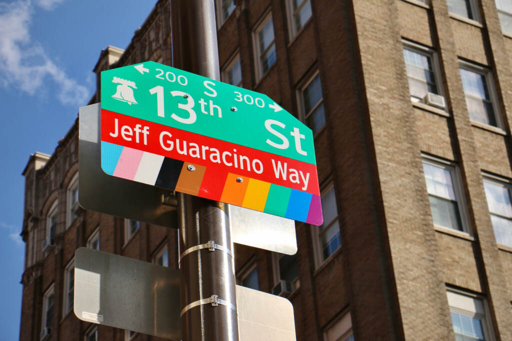 2022 10 11-e lee-philadelphia 13th street-jeff guaracino street naming sign A portion of 13th Street in Philadelphia's Gayborhood has been renamed for Jeff Guaracino, the 48-year-old CEO of Visit Philadelphia, who died in December of 2021. (Emma Lee/WHYY)