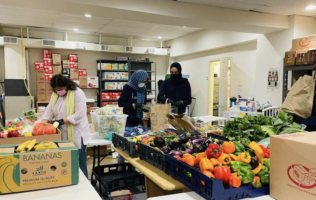 307129998_10160112615983936_6866697993651415443_n ICNA Relief volunteers organize fresh produce from the Green Resource Center. ICNA Relief serves about 100 families a week in Norristown. (Courtesy of ICNA Relief)