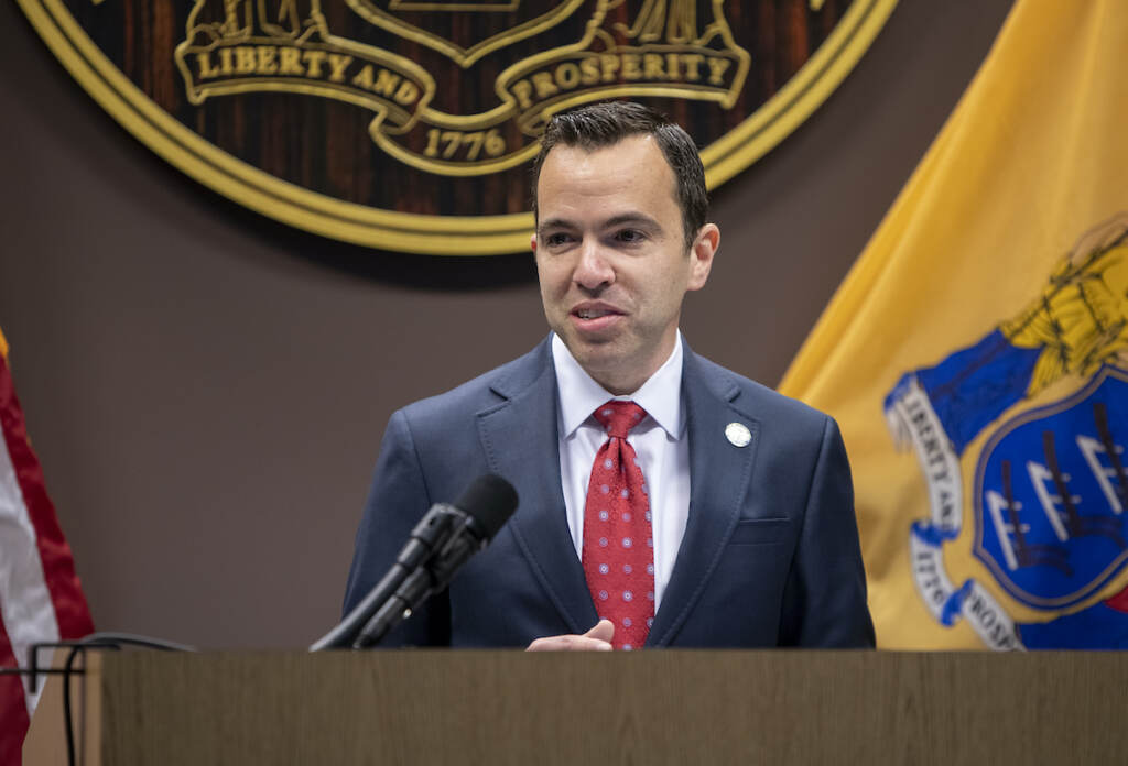 Governor Murphy, Acting Attorney General Platkin, and New Jersey State Police Superintendent Colonel Callahan announce an additional class of State Police troopers in FY2023 on April 18, 2022 at the ROIC in Ewing, NJ. attorney general matt platkin speaks at a podium