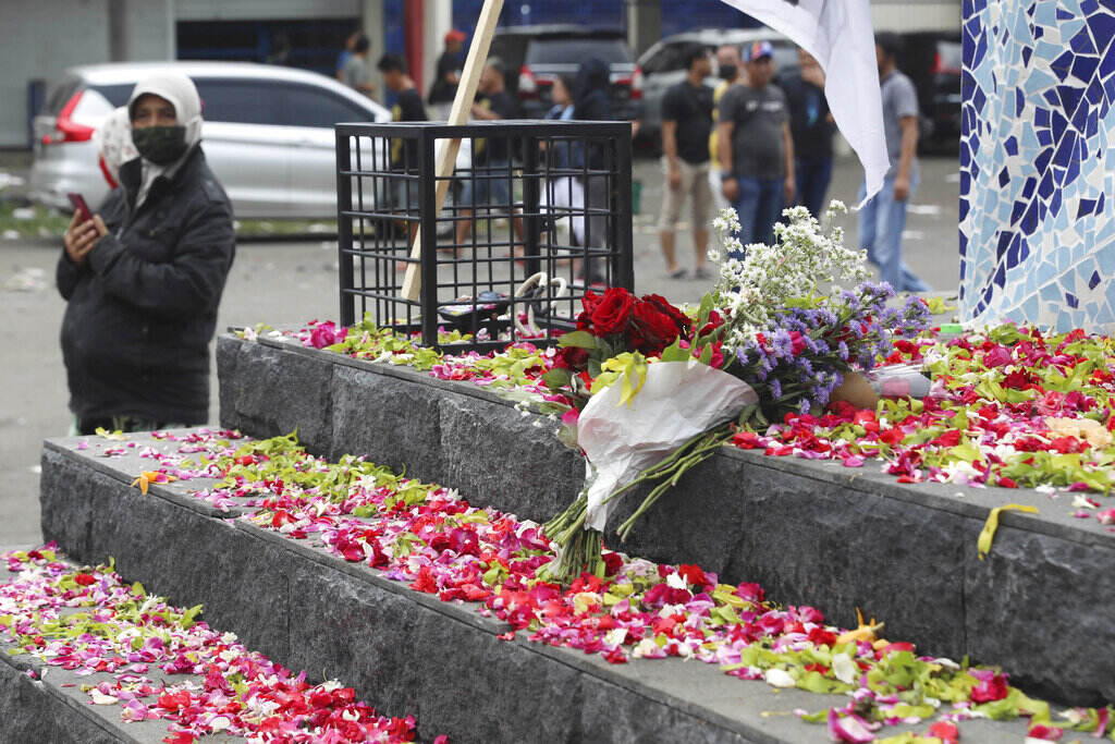 Indonesia Soccer Deaths Flowers are shown at a memorial