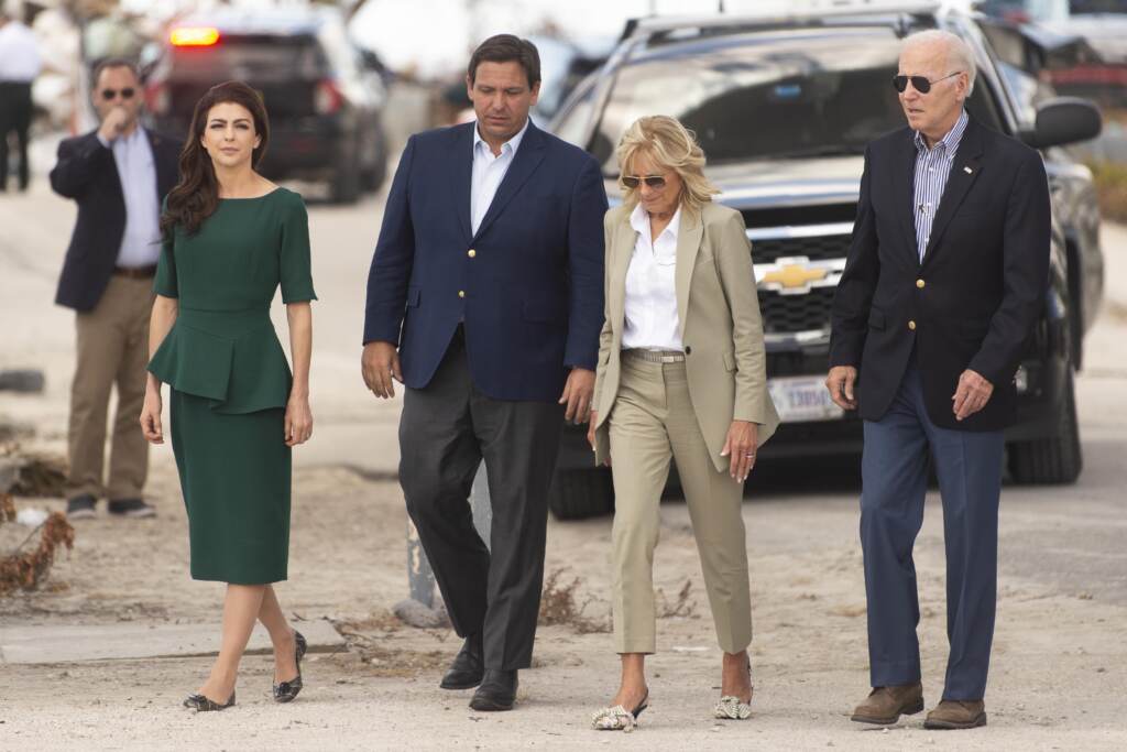 Tropical Weather Biden (From left) Florida's first lady Casey DeSantis, Gov. Ron DeSantis, first lady Jill Biden and President Joe Biden arrive at Fort Myers Beach, Fla., Wednesday, Oct. 5, 2022, to survey the damage caused by Hurricane Ian. (Saul Young/Knoxville News Sentinel via AP, Pool)