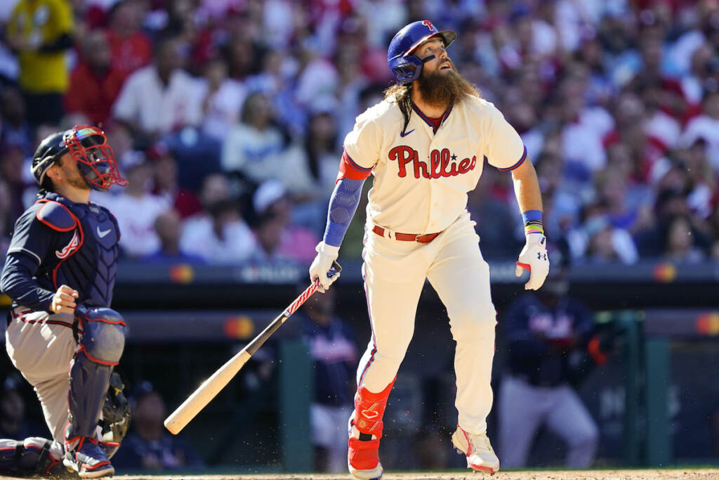 NLDS Phillies Braves Baseball A Phillies player watches his home run.