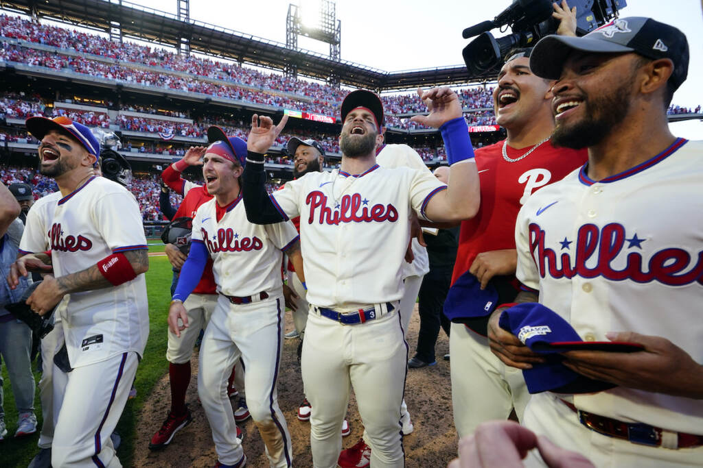 NLDS Phillies Braves Baseball The Philadelphia Phillies celebrate a win over the Atlanta Braves after Game 4 of baseball's National League Division Series, Saturday, Oct. 15, 2022, in Philadelphia. The Philadelphia Phillies won, 8-3. (AP Photo/Matt Rourke)