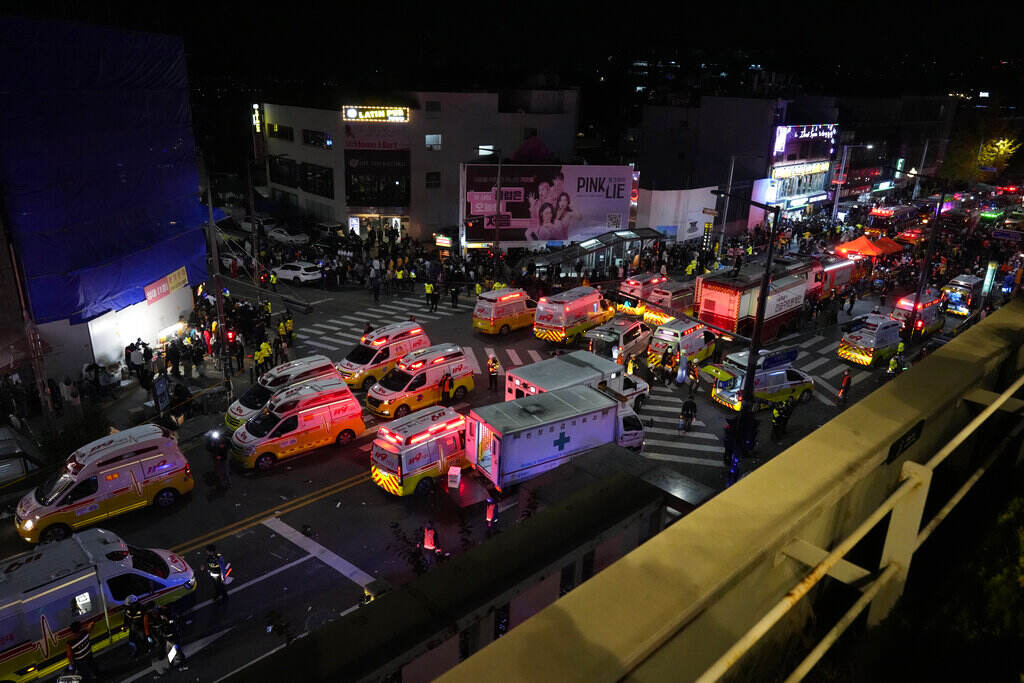 Ambulances and emergency responders are visible from above.