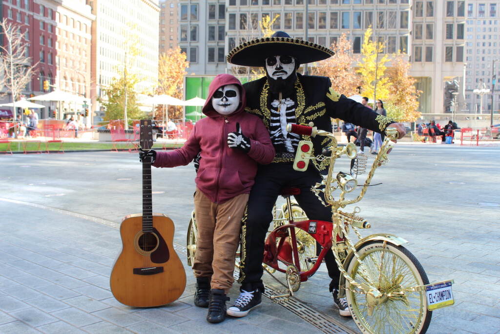 IMG_1029 People who participated in a community bike ride on Sunday were encouraged to decorate their bicycles and to dress up as Catrinas or Calaveras. (Cory Sharber/WHYY)