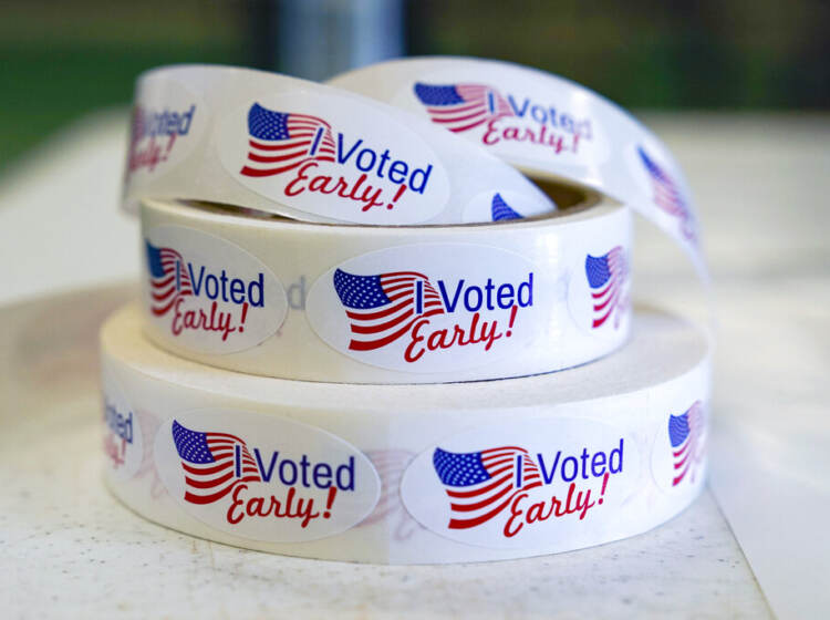 An up-close view of a roll of stickers that read 