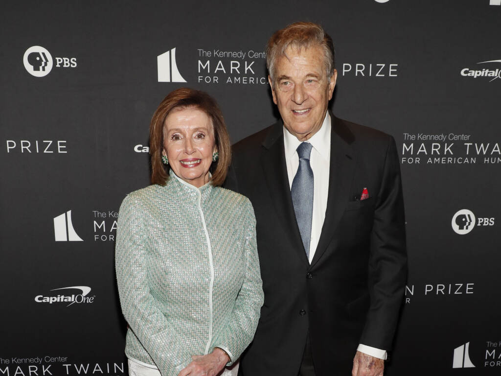 House Speaker Nancy Pelosi and her husband, Paul Pelosi, are seen here at the 23rd Annual Mark Twain Prize For American Humor at The Kennedy Center on April 24, 2022 in Washington, D.C. Nancy Pelosi stands next to her husband.