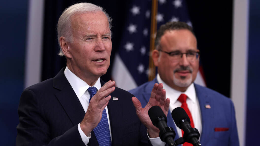 President Biden Delivers Update On The Student Debt Relief Portal Beta Test President Joe Biden speaks on the student debt relief plan as Secretary of Education Miguel Cardona (right) listens
