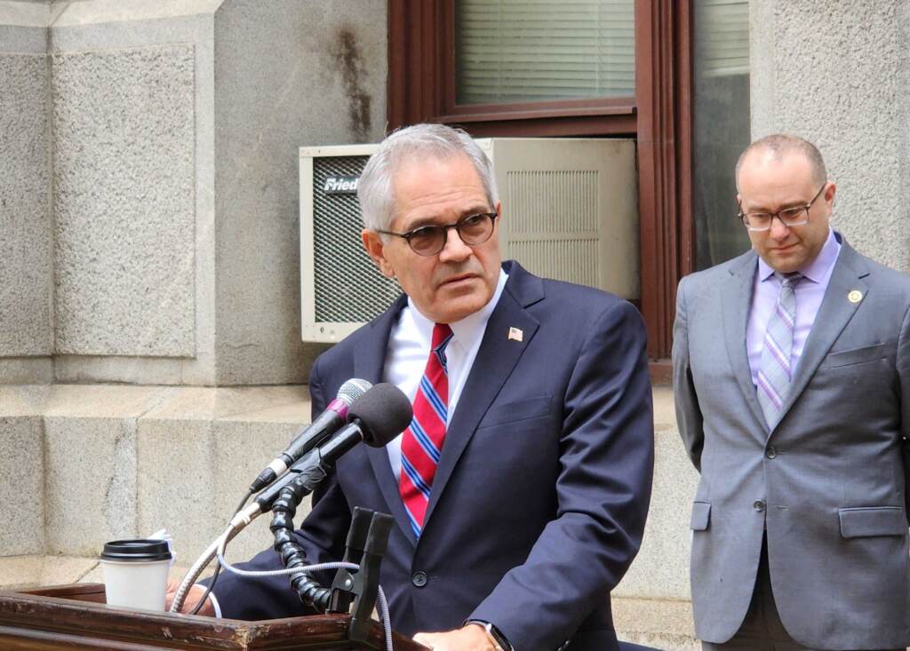 krasner-t-macdonald-2022-10-13 Krasner speaks from the podium.