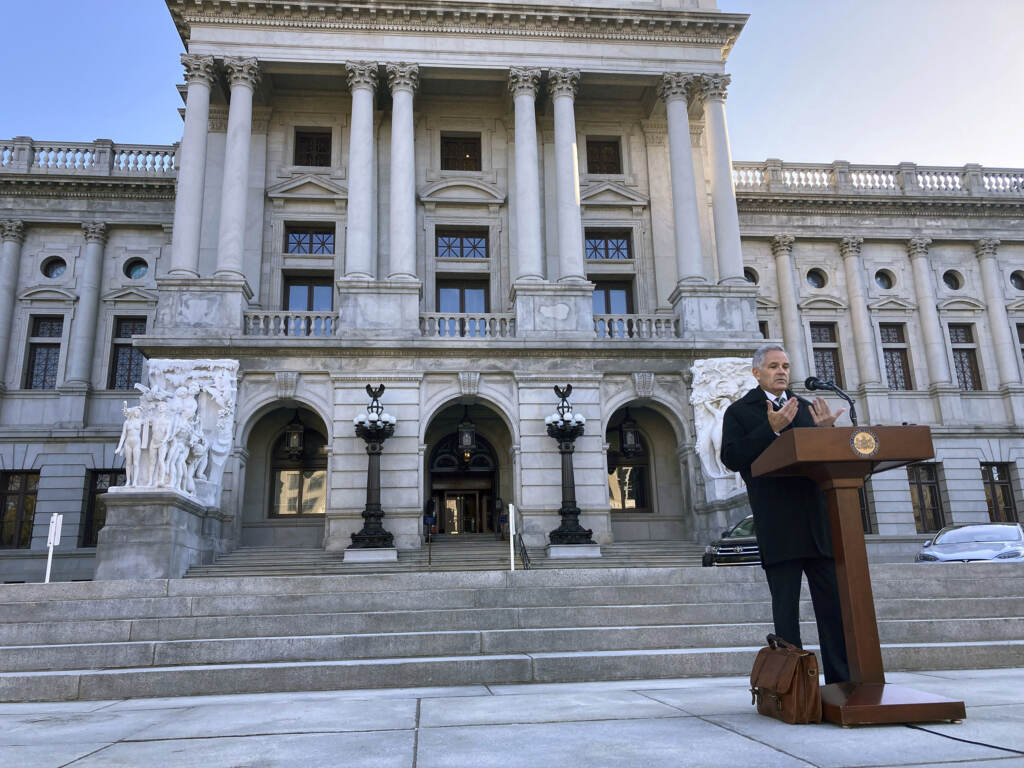 Philadelphia Prosecutor DA Larry Krasner speaks outside of the State Capitol in Harrisburg.