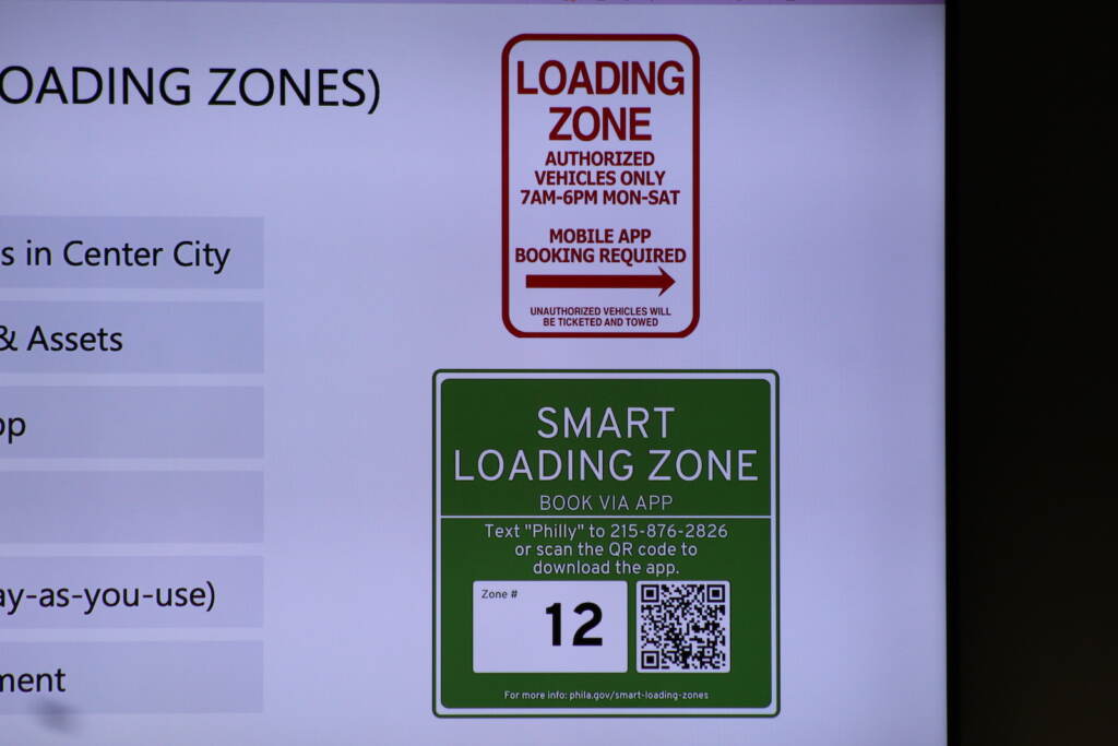 loading-zones-c-sharber-2022-10-03-1 Signs at the loading zones will have a QR code that drivers can scan to download the app. (Cory Sharber/WHYY)