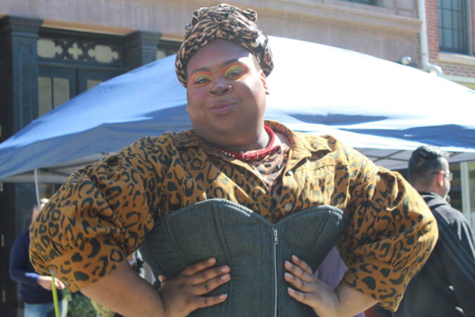 A performer poses for the camera.