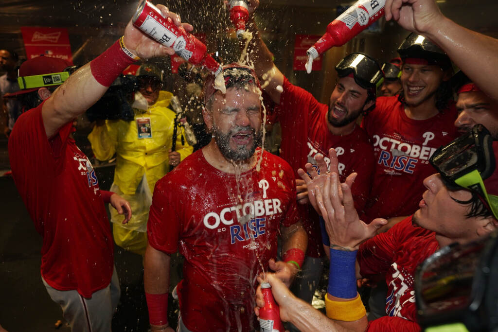 APTOPIX Phillies Astros Baseball Philadelphia Phillies' Kyle Schwarber is doused in beer in celebration