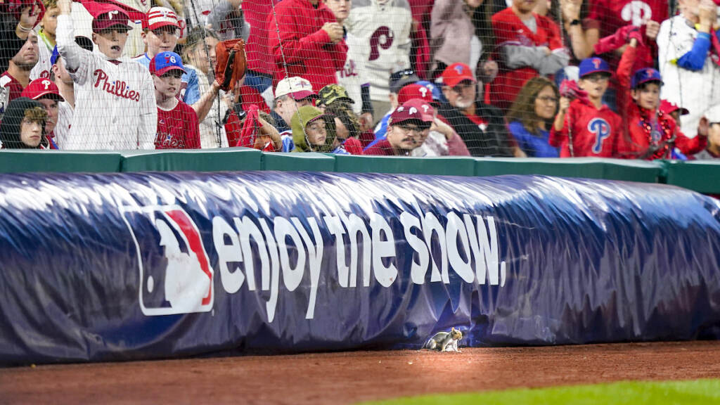 Braves Phillies Baseball A squirrel is seen on the field as fans cheers during the seventh inning in Game 3 of baseball's National League Division Series between the Philadelphia Phillies and the Atlanta Braves, Friday, Oct. 14, 2022, in Philadelphia. (AP Photo/Matt Slocum)
