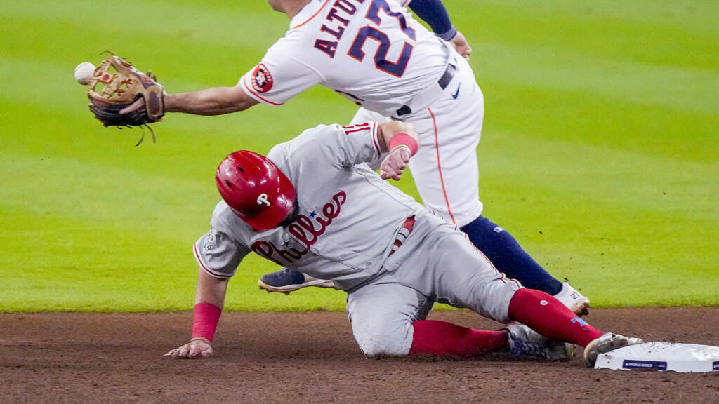 World Series Phillies Astros Baseball Phillies player Kyle Schwarber slides into second base.