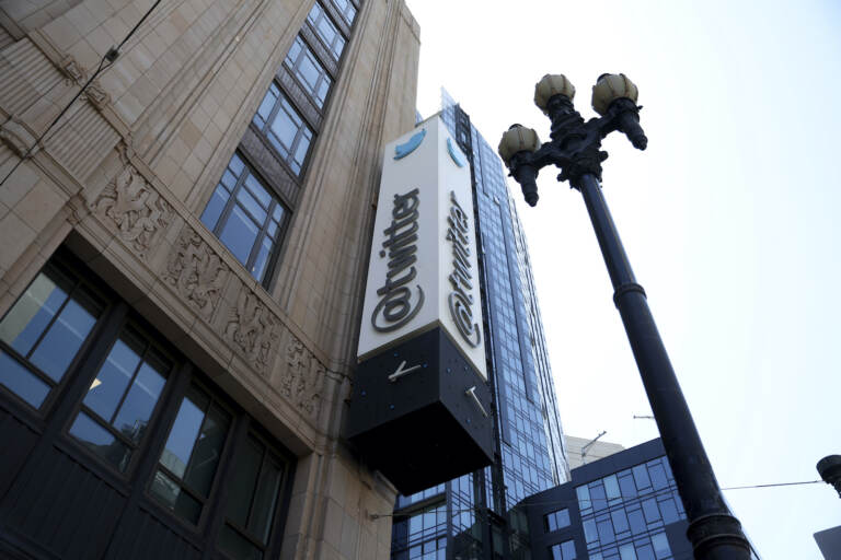 FILE - A sign is pictured outside the Twitter headquarters in San Francisco, Monday, April 25, 2022. Trading in shares of Twitter were halted, Tuesday, Oct. 4,  after the stock spiked on reports that Elon Musk would proceed with his $44 billion deal to buy the company after months of legal battles.(AP Photo/Jed Jacobsohn, File)