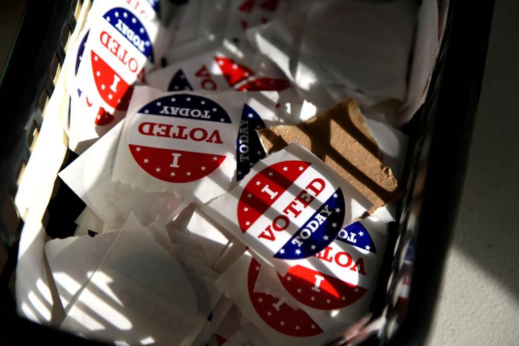 vote-2022-spotlight-pa-elections-governor-candidates I Voted stickers are shown.