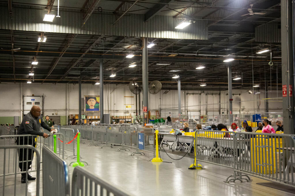 2022 08 01 – e cohe – ballot counting – philadelphia ballot processing center-3360 A large warehouse is shown, with election workers working to process mail ballots.