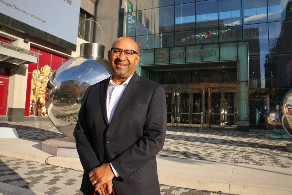 2022 10 31-e lee-michael nutter-philadelphia fashion district 9th and market-proposed stadium no hat Former Philly Mayor Michael Nutter stands in front of a building.