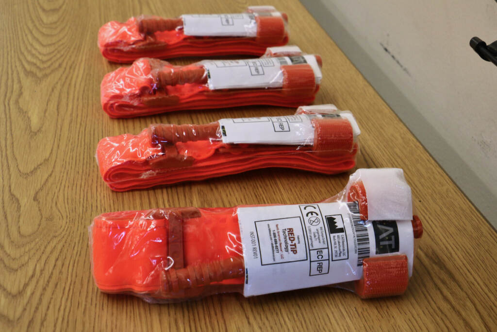 A row of packages of tourniquets.