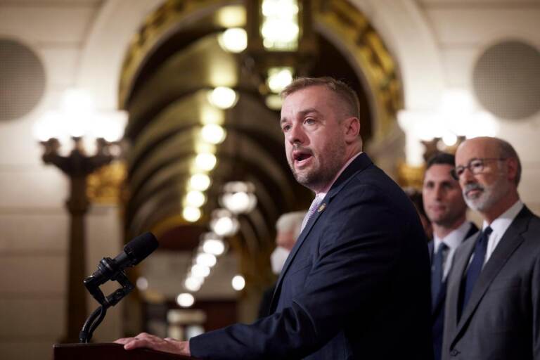 Bryan Cutler speaks from a podium