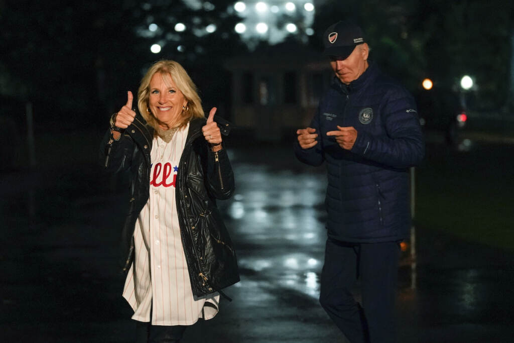 Joe Biden, Jill Biden First lady Jill Biden gestures in support of the Philadelphia Phillies as she and President Joe Biden walk on the South Lawn of the White House after stepping off Marine One, Sunday, Oct. 23, 2022, in Washington. The Bidens are returning to Washington after spending the weekend at their home in Rehoboth Beach, Del. (AP Photo/Patrick Semansky)