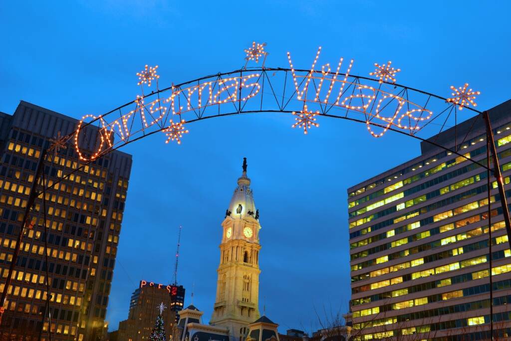 Christmas Village Philadelphia_City Hall with Christmas Village Sign, Credit Russ Brown Photography (Russ Brown Photography/Courtesy of Christmas Village in Philadelphia)