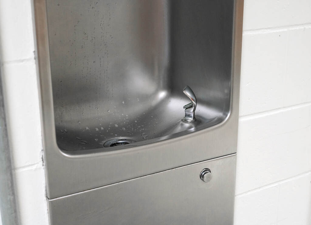 Close Up On Drinking Water Fountain In School close up on drinking water fountain in school