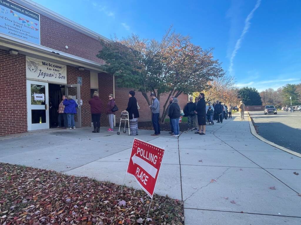skyline Delaware voters waited in line to cast their ballots at Skyline Middle School in Pike Creek. (Cris Barrish/WHYY)