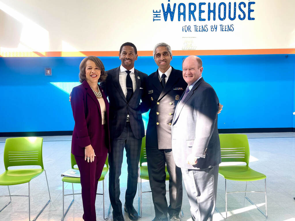 vivek-murthy-j-perez-2022-11-22 State officials alongside U.S. Surgeon General Vivek Murthy at The Warehouse in Wilmington, Delaware. (Johnny Perez-Gonzalez/WHYY)