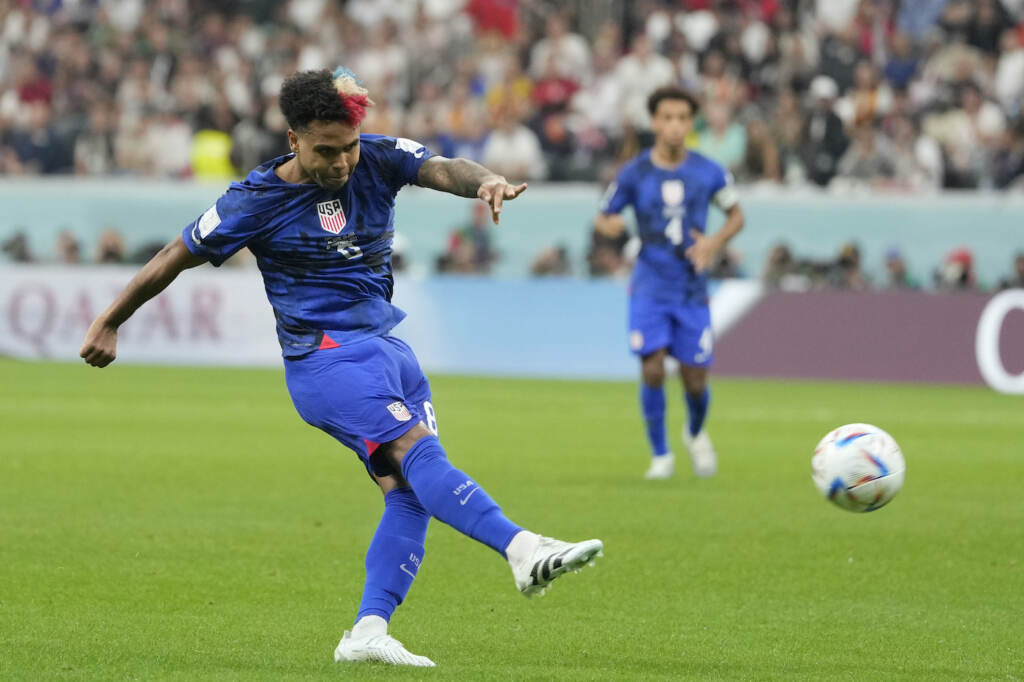 WCup England United States Soccer Weston McKennie of the United States kicks the ball during the World Cup group B soccer match between England and The United States, at the Al Bayt Stadium in Al Khor, Qatar, Friday, Nov. 25, 2022. (AP Photo/Andre Penner)