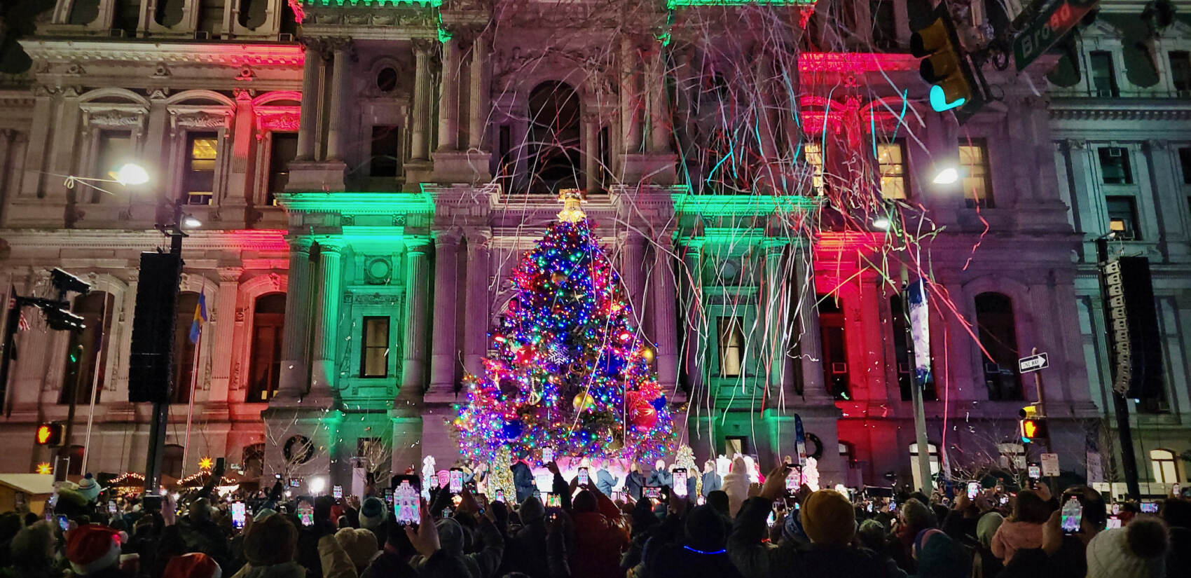 A Christmas tree is lit outside Philadelphia City Hall