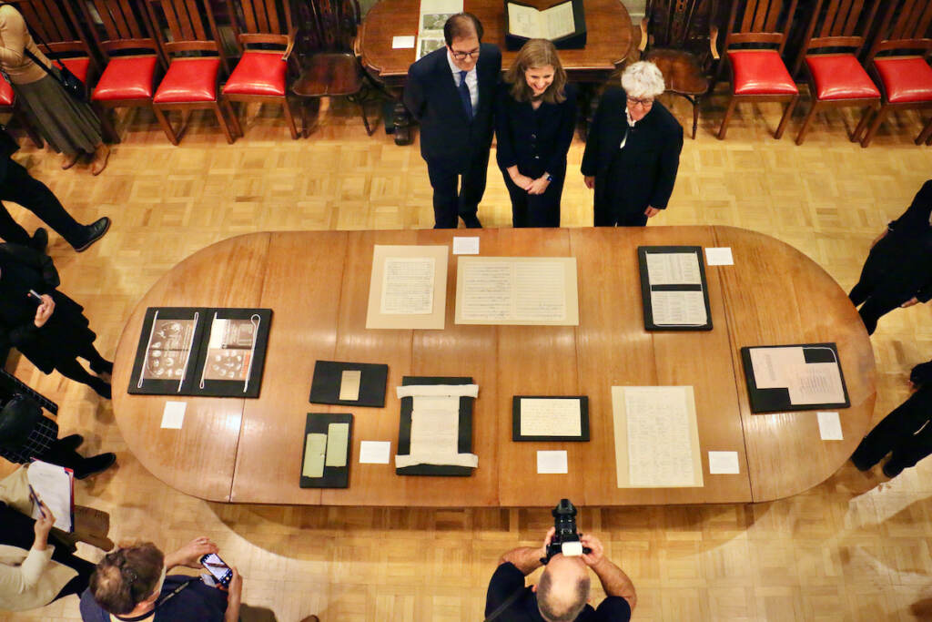2022 12 08-e lee-matias tarnopolsky elizabeth magill constantia constantinou-philadelphia university of pennsylvania lea library-philadelphia orchestra archives An aerial view of items displayed on a table.