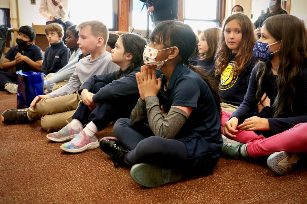 2022 12 14-philadelphia fanny coppin elementary school-20 in 20 reading program third graders mask File - Third graders at Fanny Coppin Elementary school listen as Superintendent Tony Watlington reads aloud from ''Looking Like Me'' by Walter Dean Myers. (Emma Lee/WHYY)