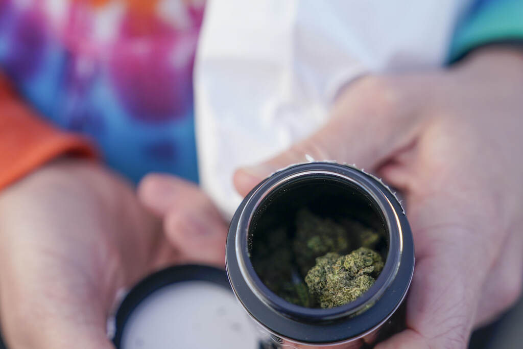 Recreational Marijuana New Jersey An up-close view of someone displaying weed that they purchased at a store in N.J.