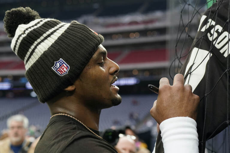 Cleveland Browns quarterback Deshaun Watson signs autographs before of an NFL football game between the Cleveland Browns and Houston Texans in Houston, Sunday, Dec. 4, 2022,. (AP Photo/Eric Gay)