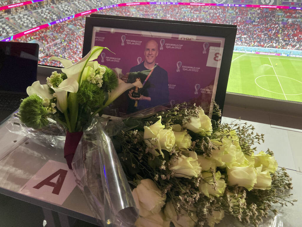 WCup England France Soccer A tribute to journalist Grant Wahl is seen on his previously assigned seat at the World Cup quarterfinal soccer match between England and France, at the Al Bayt Stadium in Al Khor, Qatar, Saturday, Dec. 10, 2022. (AP Photo/Graham Dunbar)
