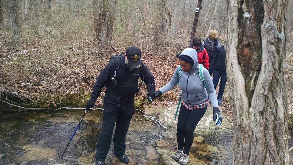 Stokes SF stream crossing in winter Hikers cross a stream in the forest.