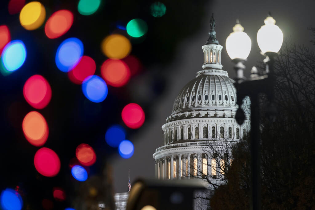 Congress Marriage Rights The Capitol is seen amid holiday lights Wednesday evening as the House of Representatives works to approve the Respect for Marriage Act, a bill already passed in the Senate to codify both interracial and same-gender marriage, in Washington, Dec. 7, 2022. (AP Photo/J. Scott Applewhite)