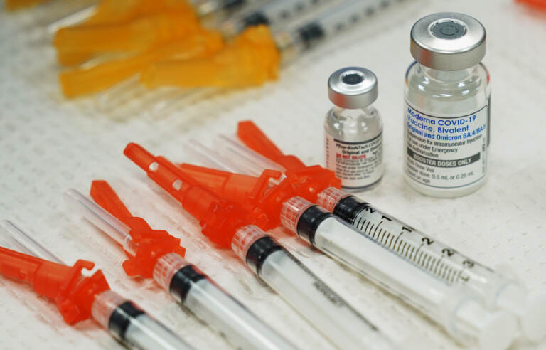OVID-19 vaccines are readied for use at a clinic